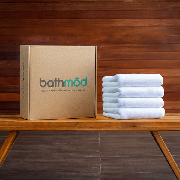 Four GOTS-certified organic cotton ribbed terry bath mats
